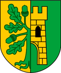 herb przedzielony na pół, z prawej baszta żółta, z lewej pół drzewa zielonego koloru. Tło z prawej zielone, z lewej żółte.