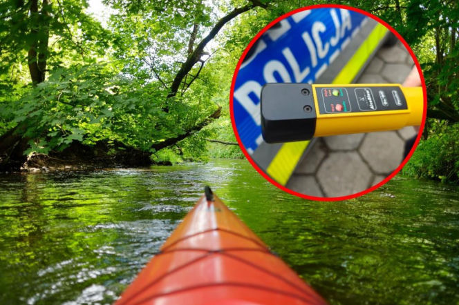 Dziób kajaka na rzece wśród drzew. Na miniaturze alkomat i radiowóz. O pijanych kajakarzach przeczytasz na SE Łódź.