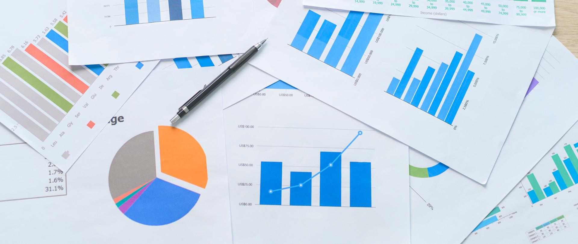 Top view of Documents with analytics data lying