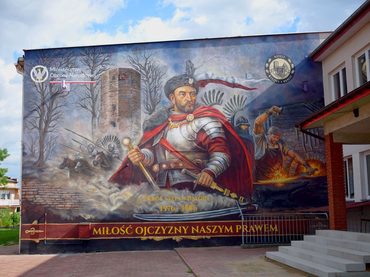 Władysławów - Stefan Batory i husaria na muralu w Wyszynie....